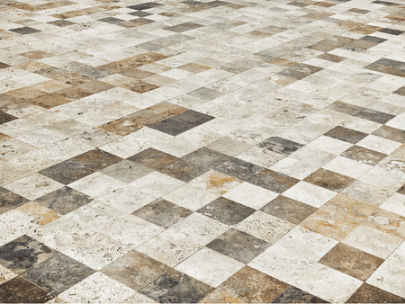 A close up of a tile floor with brown and white squares.